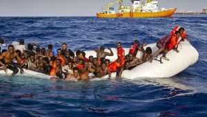Migrant survivors in dinghy