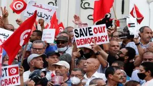Tunisians rally against government media crackdowns