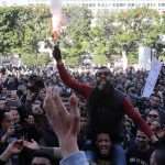 Tunisians mark revolution anniversary with demonstrations