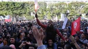 Tunisians mark revolution anniversary with demonstrations