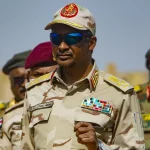 US says militia committing genocide in Sudan, sanctions leader