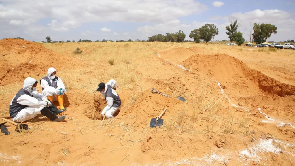 Nearly 50 migrant bodies discovered in Libyan mass graves