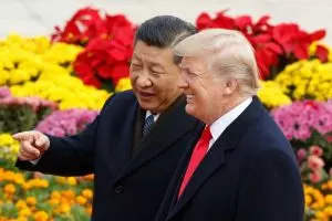 Trump claims China talks as Beijing denies negotiations