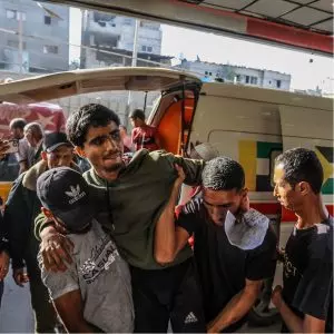 ‘This is an ambush’: dozens killed in Gaza aid site shooting