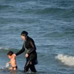 Syrian women required to wear burkinis at public beaches