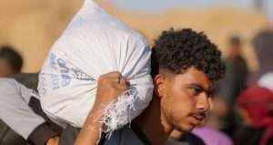 Aid group chief defends work despite Palestinian aid hub deaths