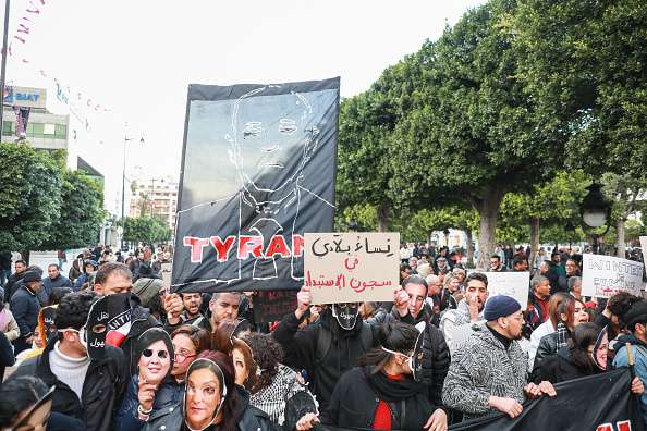 Tunisian court jails journalist as rights groups protest crackdown