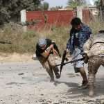Libyan armed groups clash near Tripoli amid fragile security deal