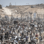 Two Palestinians killed while waiting for aid