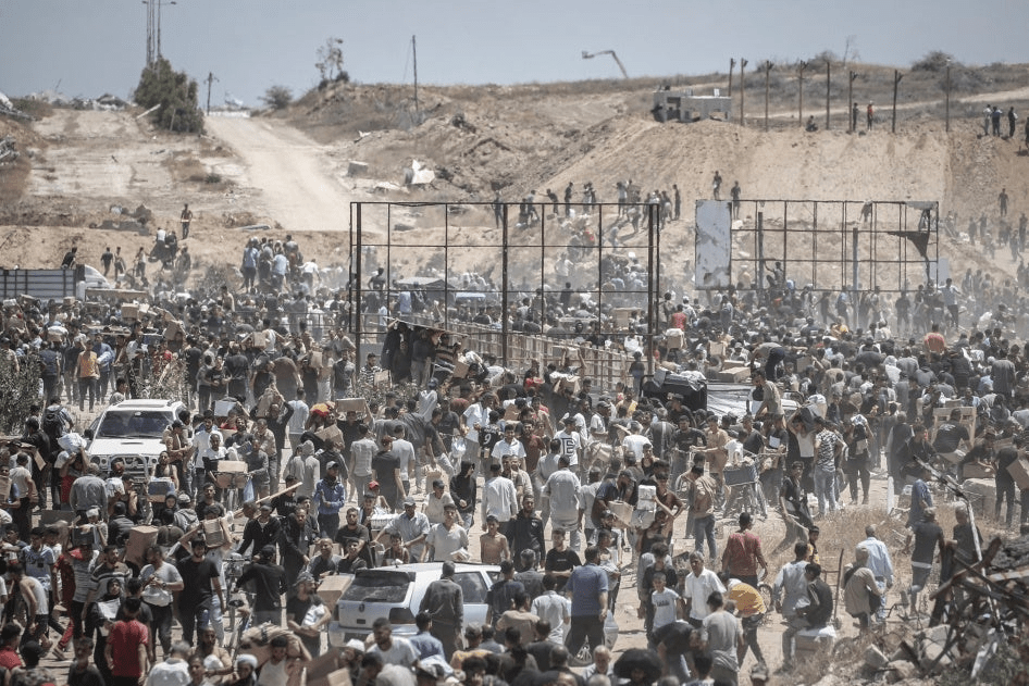 Two Palestinians killed while waiting for aid