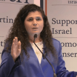 Israeli minister wears bulletproof vest in UK