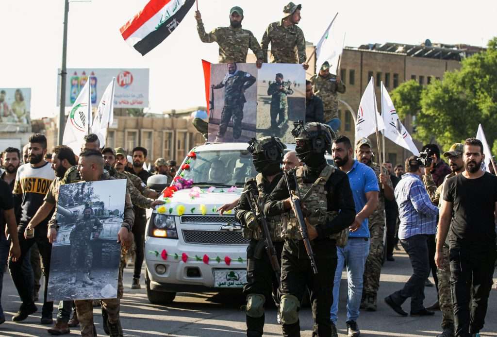 Iraq seeks weapons control as foreign troops plan withdrawal