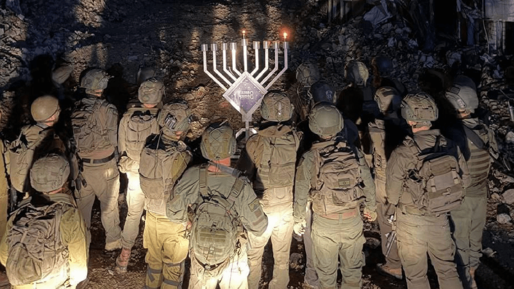 Israeli soldiers light Hanukkah candles in occupied Syria
