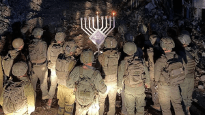 Israeli soldiers light Hanukkah candles in occupied Syria